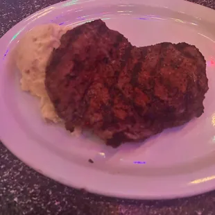 Bad pic, but the friday steak dinner is a 12-oz sirloin with garlic mashed potatoes. For $16 this is a great deal.
