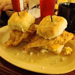 Chicken fried chicken biscuit sandwich with egg and cheese