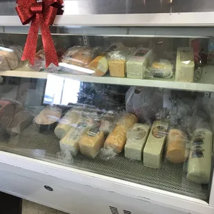 a display of cheeses and pastries