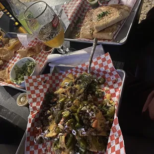 Nachos, quesadilla, and chips and guacamole