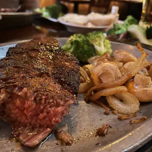 steak, potatoes, and broccoli