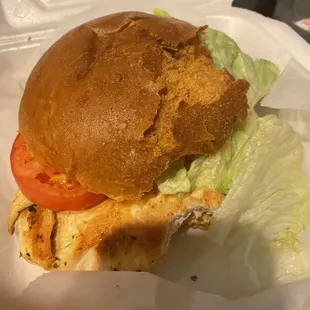 The horrible bread is old and the burger is fatal.