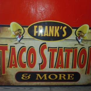 a sign for frank&apos;s taco station