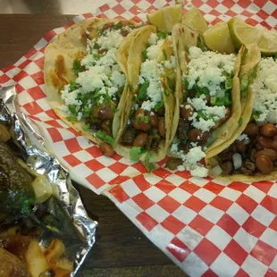 Flour Fajita and Bean Tacos with grilled onions and jalepeno