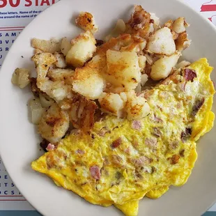 Ham and bacon omelet with potatoes