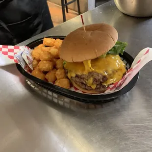 The Frankie's double meat burger with cheddar cheese and tots