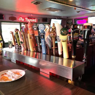 a bar with beer taps