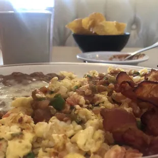 Eggs Mexicana w/ refríed beans &amp; a side of bacon. Coffee was really good as well.