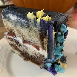 Here is a look at one of our marble cakes with cream cheese frosting filling and fresh strawberries. Absolutely delicious!!!