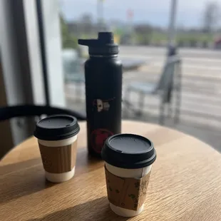 Decaf latte w/honey, and a traditional latte