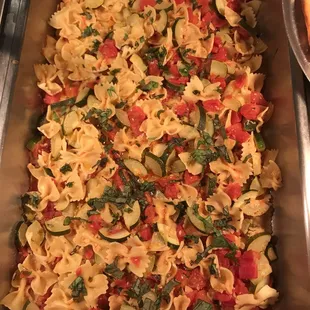 Bow tie pasta with zucchini and chunky tomatoes