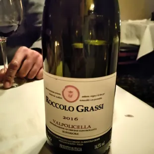 a bottle of wine on a table