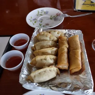 Xui-Mai fried dumpling and Alligator veggie egg rolls.