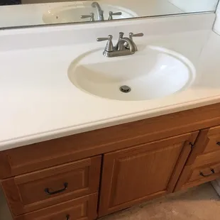 They installed this beautiful vanity, and moved the mirror up.