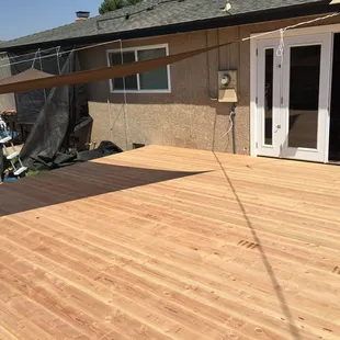 Added a deck onto the backyard and installed French doors