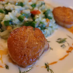 Scallops with veggie risotto.