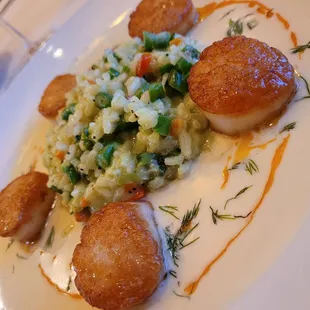 Scallops with veggie risotto.