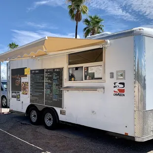 a food truck parked in a parking lot