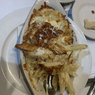 Baked penne Alfredo with chicken, tiny bit of burnt chicken and very dry