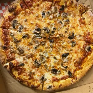 Fratelli&apos;s large Sausage and Mushroom pizza missing the sausage