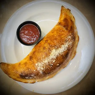 These Calzones!  They&apos;re HUGE!  Good luck finishing it!