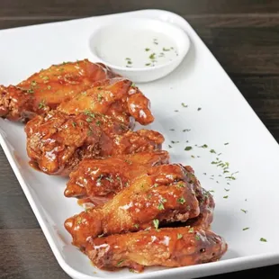 a platter of chicken wings