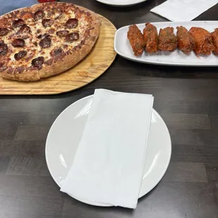 the Medium Pepperoni Pizza and 6 buffalo wings