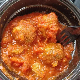 Side of absolutely delicious meatballs. That sauce is killer.