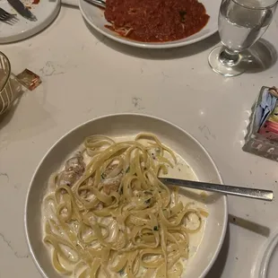 Chicken fettuccine Alfredo and chicken parmigiana