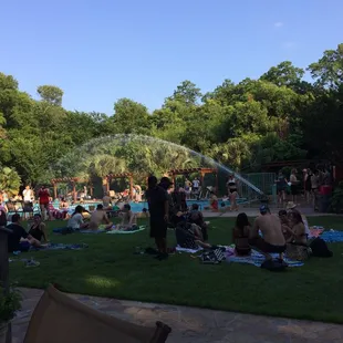 a crowd of people in a park