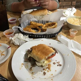The leftover carnage. Grilled roast beef, skinny onion rings and mac and cheese.  Done
