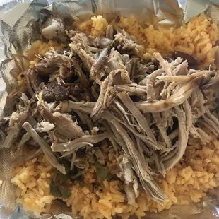 Pernil meal - Pernil (seasoned pulled pork), Spanish rice, and beans