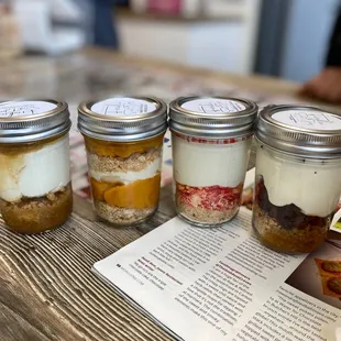 Caramel cheesecake, sweet potato cheesecake, strawberry crunch cheesecake, caramel brownie cheesecake