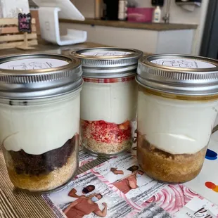 three jars of desserts
