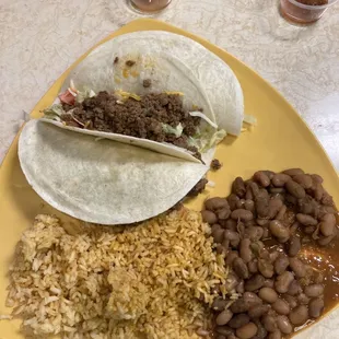 Three beef tacos, rice &amp; pintos