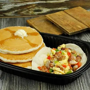 a breakfast of pancakes and eggs