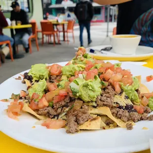 Cold impossible meat nachos .. wouldn&apos;t recommend .