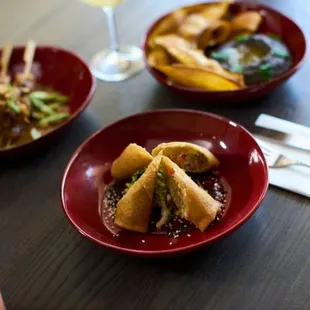 three plates of food on a table