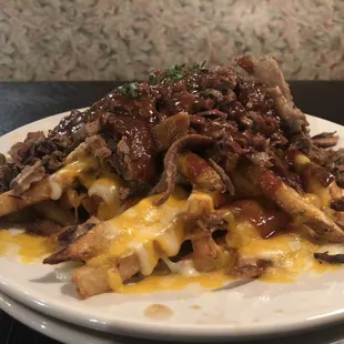 a plate of loaded fries