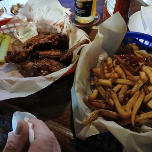 Dry wings but great fries!