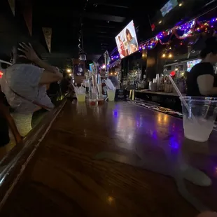 people sitting at the bar