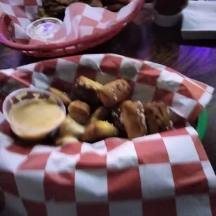 Pretzel bites Chicken strips and fries