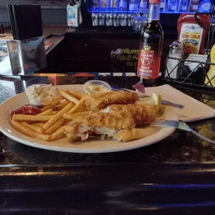 Fish &amp; Chips served with malt vinegar