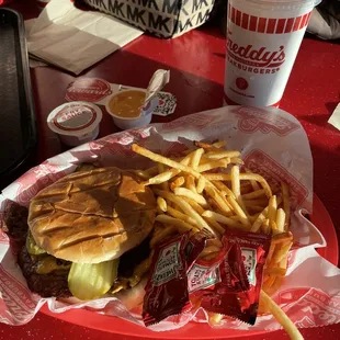 Burger, Fries, and a drink. Those Fry sauce packets are quite lovely.