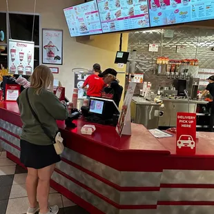 Blondie behind the counter. Clueless.