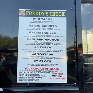 a menu on a food truck