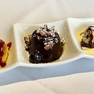 Dessert trio: mango cheesecake, rum euphoria, and chocolate mousse