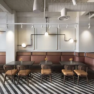 a dining area with a black and white checkered floor