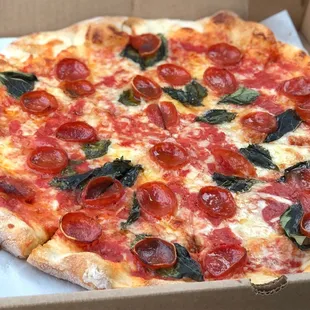 Cheese and Pepperoni Pizza with Basil