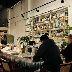 people sitting at a bar